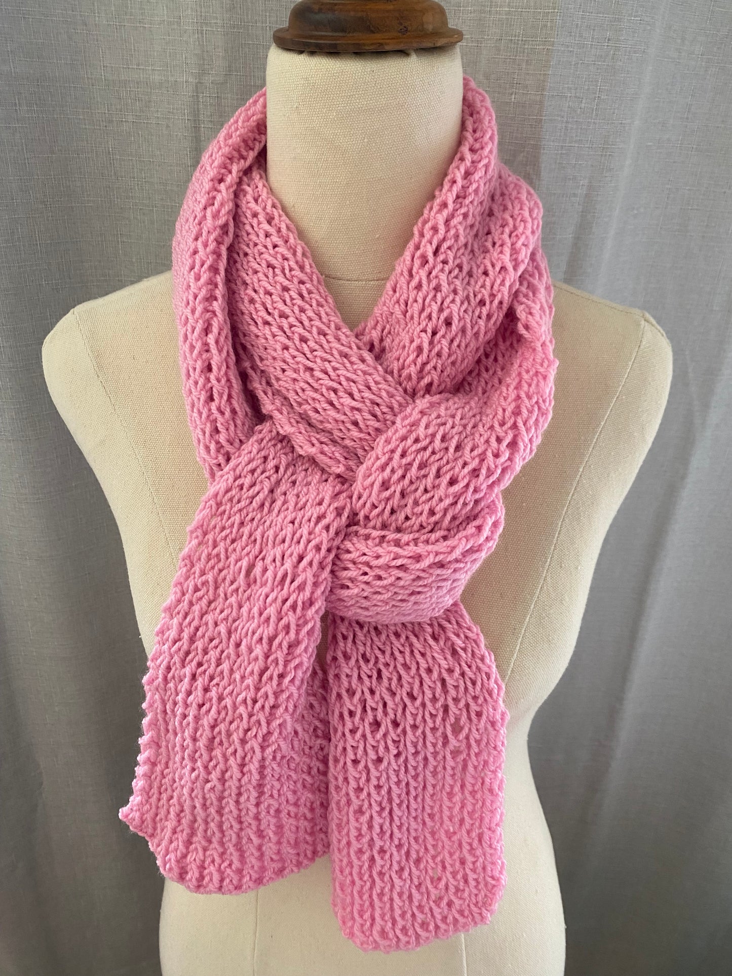 Genuinely hand knitted scarf in rose pink