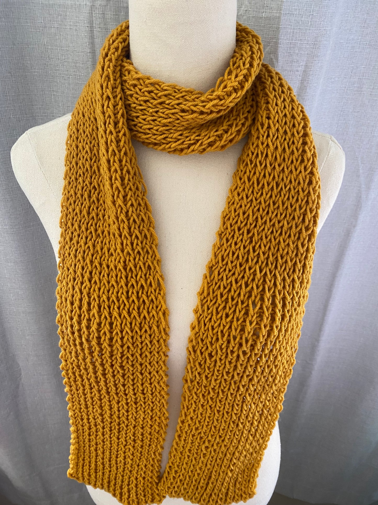 Genuinely hand knitted scarf in mustard yellow