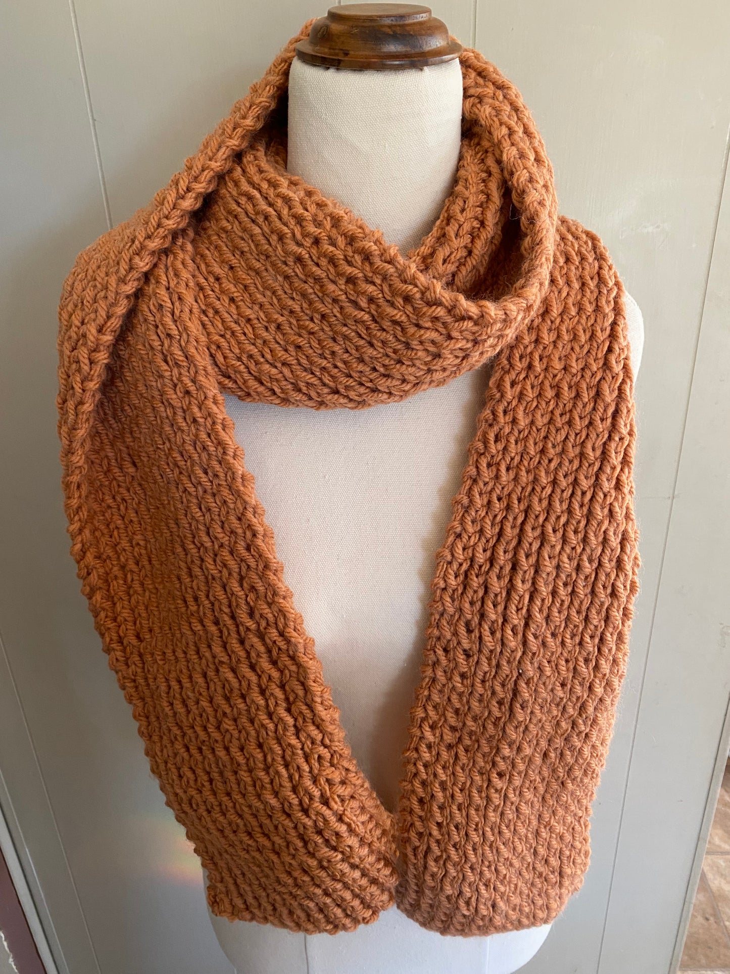 Genuinely hand knitted scarf in brown