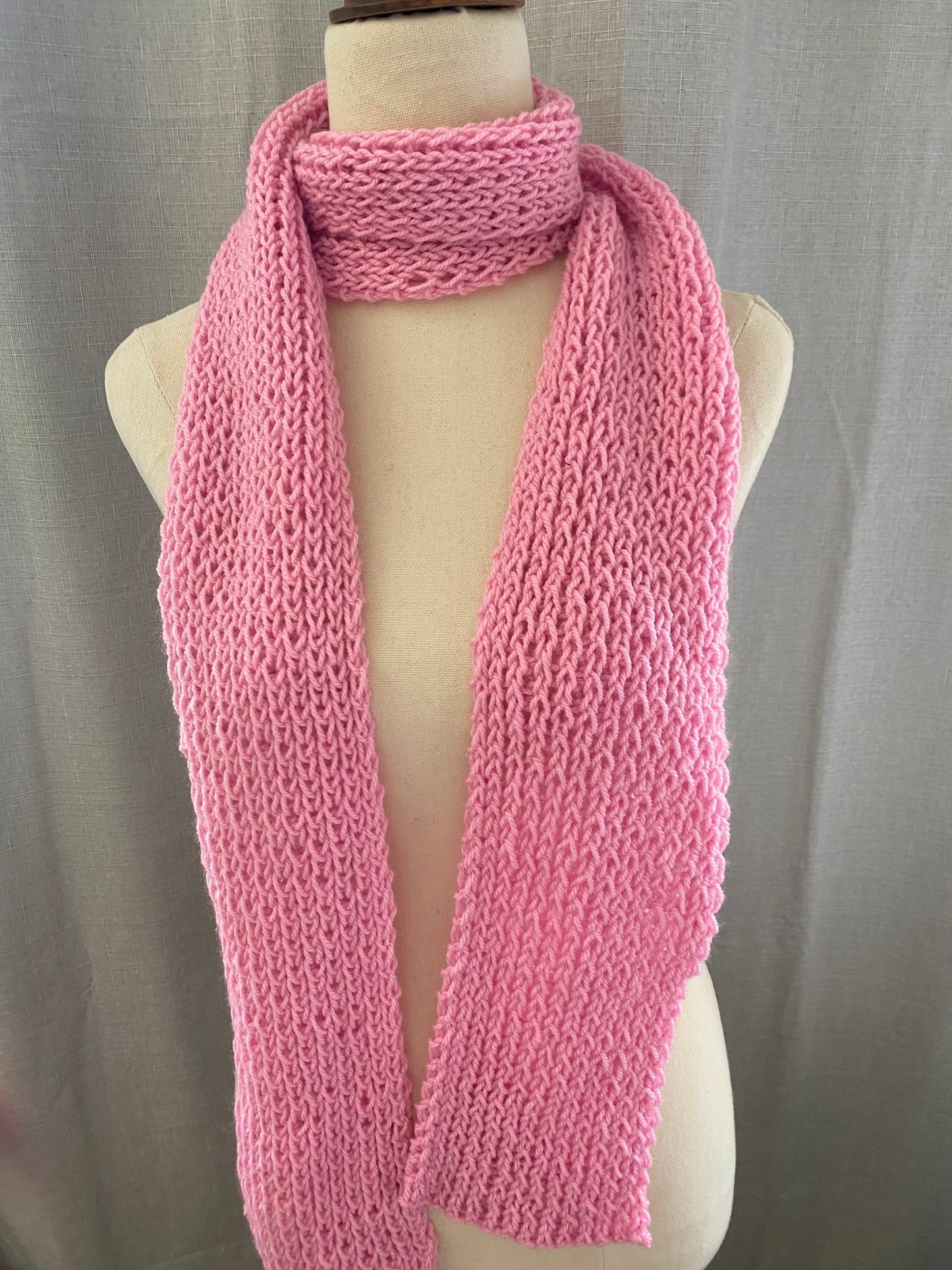 Genuinely hand knitted scarf in rose pink