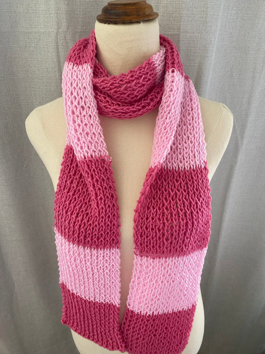 Genuinely hand knitted scarf in rose and berry pink