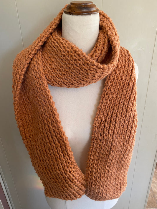 Genuinely hand knitted scarf in brown