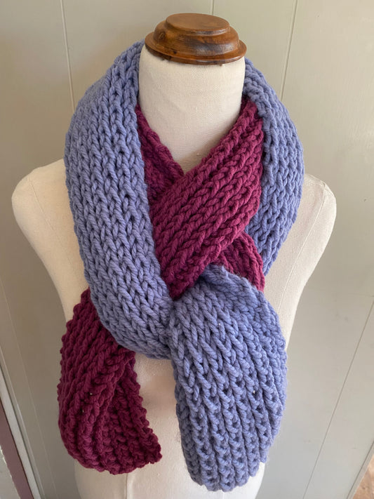 Genuinely hand knitted scarf in magenta and blue